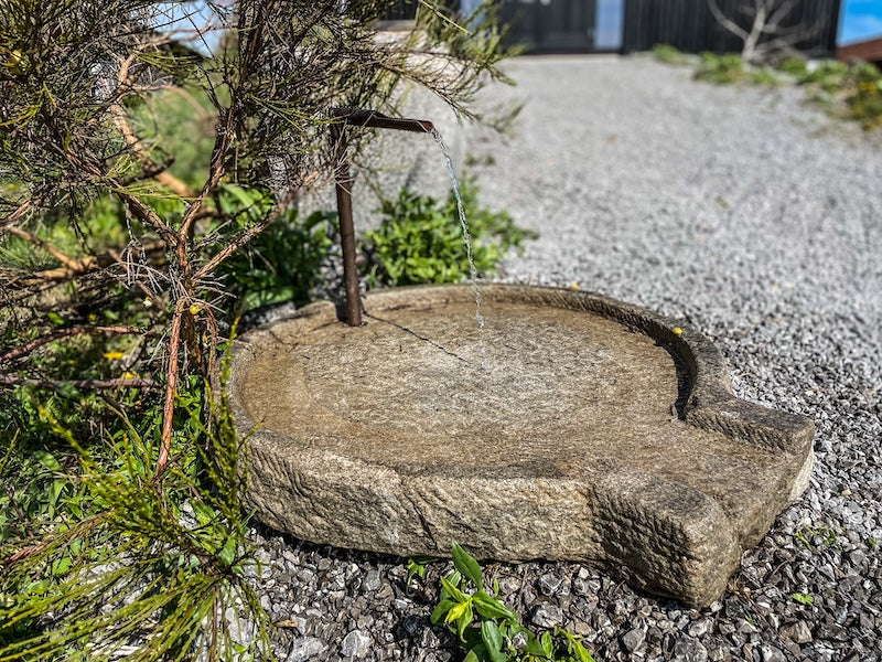 Brunneneinlauf aus Stein