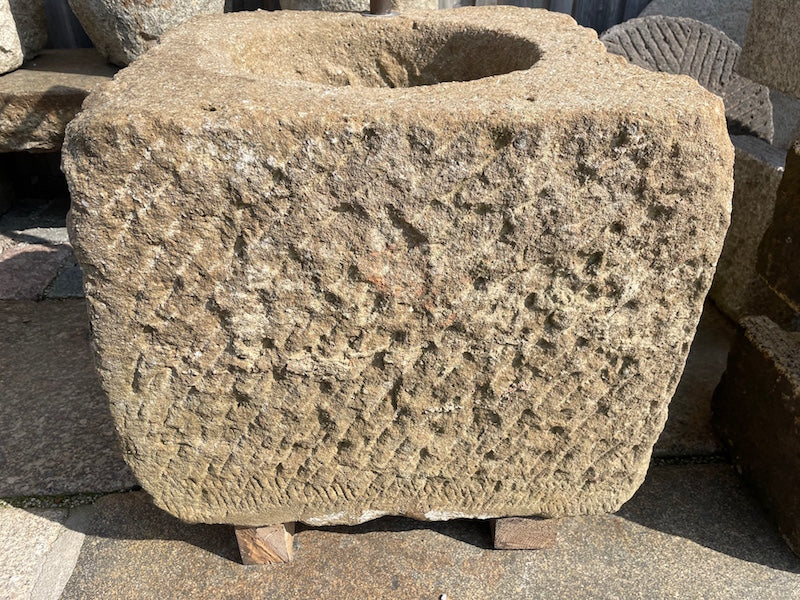 Alter Brunnen aus Sandstein Detail Oberfläche
