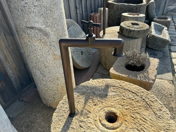 Wasserstelle im Garten gestalten