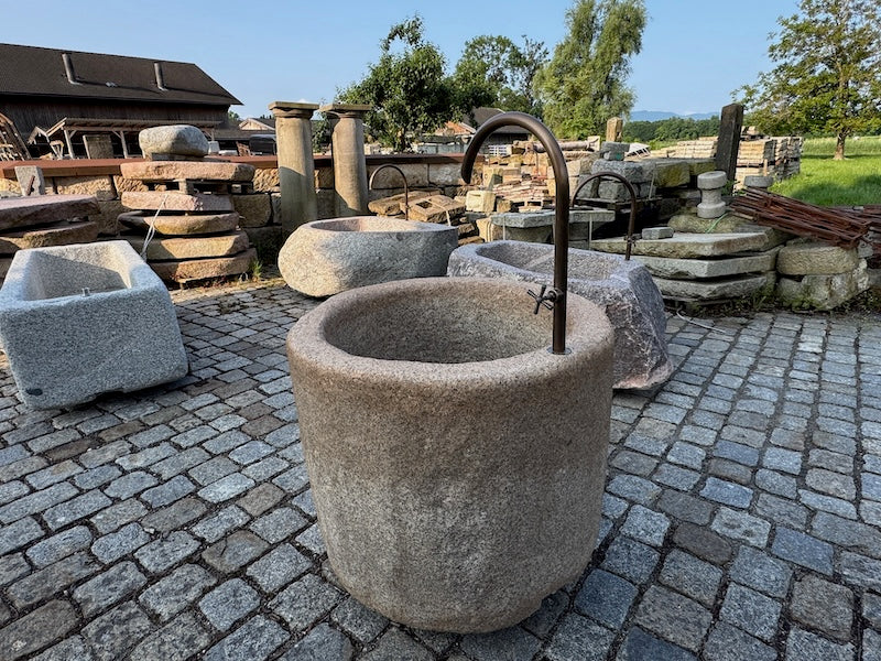 Natursteinbrunnen rund kaufen