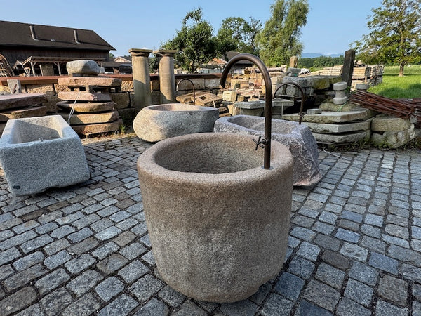 Natursteinbrunnen rund kaufen