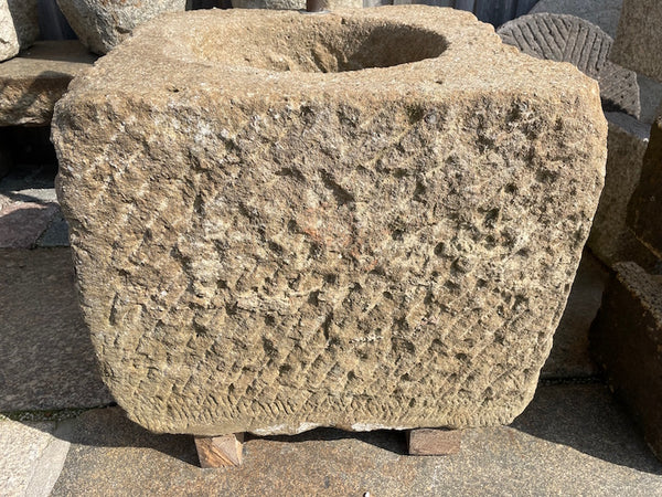 Alter Brunnen aus Sandstein Detail Oberfläche