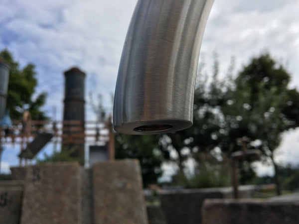 Granitbrunnen rund mit Edelstahleinlauf