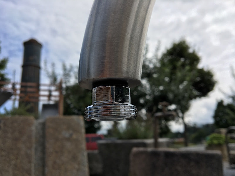 Granitbrunnen rund mit Edelstahleinlauf