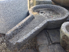 Steinbehältnis aus alter Mühle