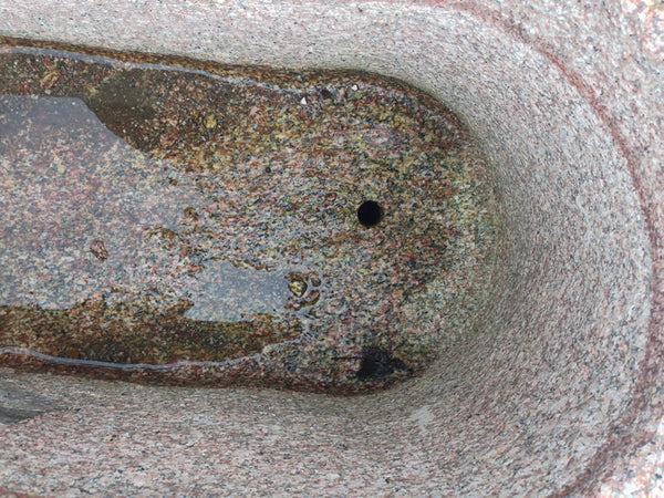 Steinbrunnen mit Bohrung